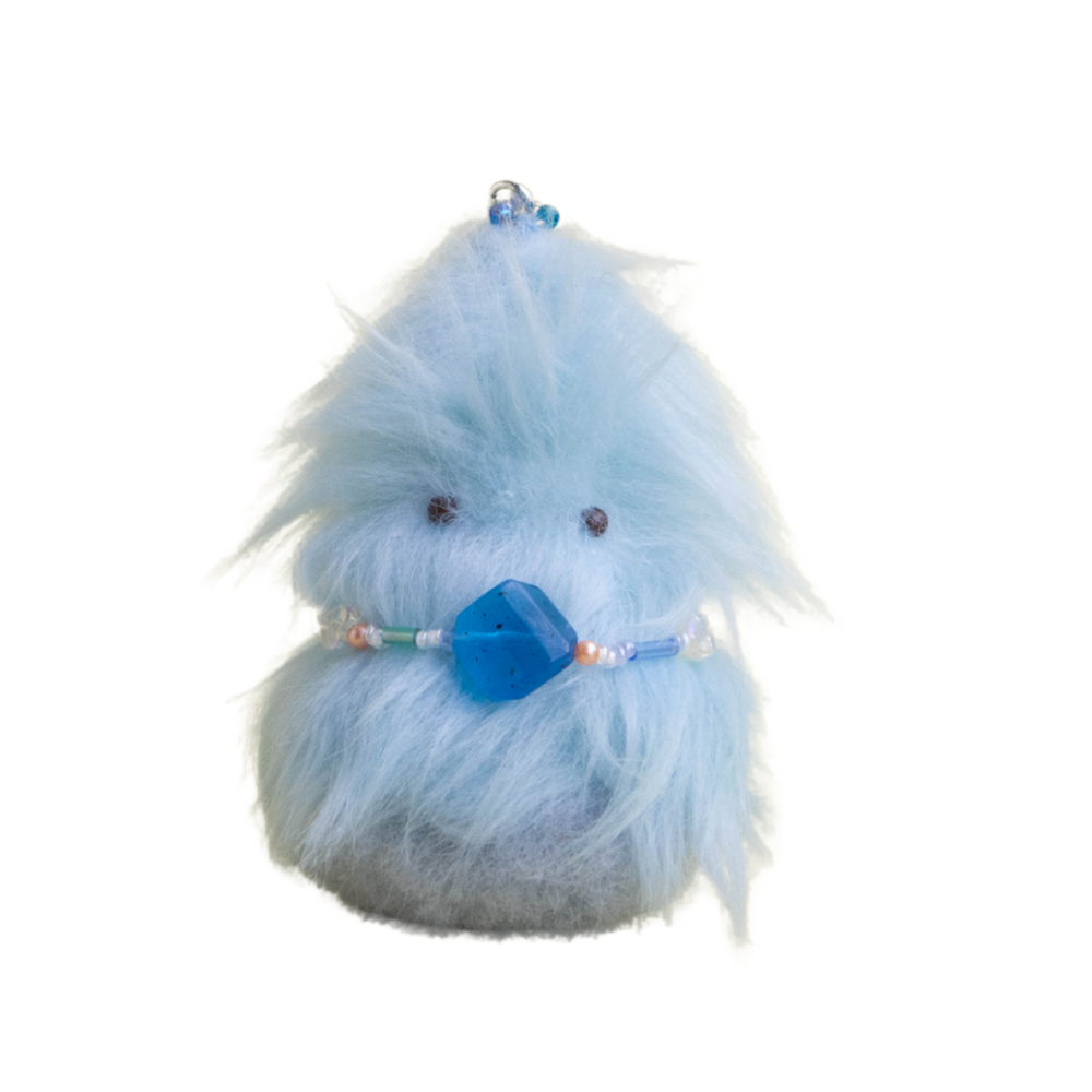 Handmade blue fluffy plush creature with beaded gemstone belt and keychain loop – Daawe Baby from Mimi Planet, collectible soft toy from Hong Kong