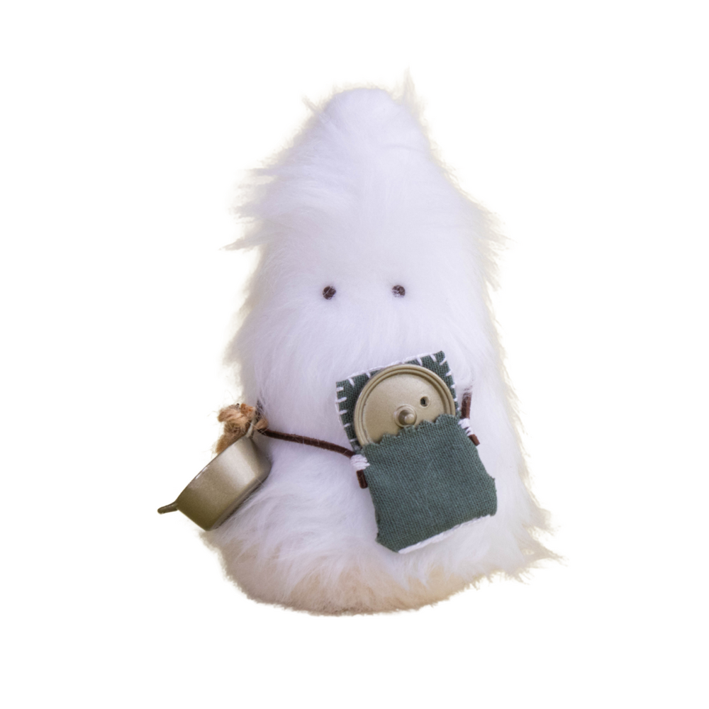 Handmade white Daawe plush creature with mini green pouch and gold pan – purity-themed collectible toy from Mimi Planet