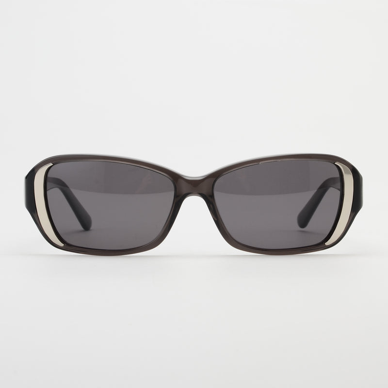 Sunglasses with dark lenses and brown frame on a white background
