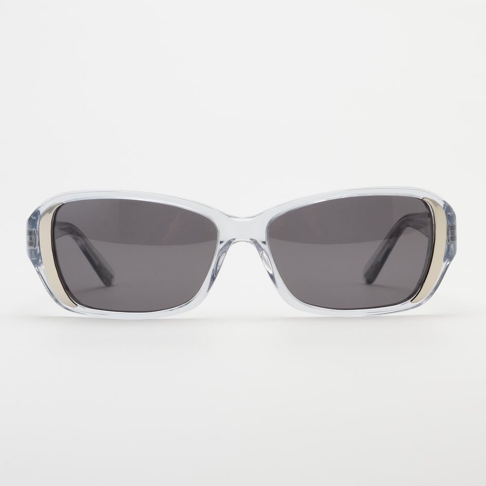 Sunglasses with clear frame and dark lenses on a white background