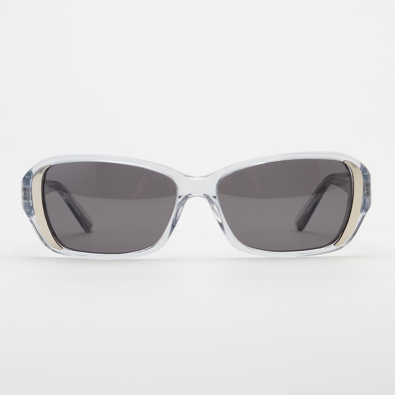 Sunglasses with clear frame and dark lenses on a white background