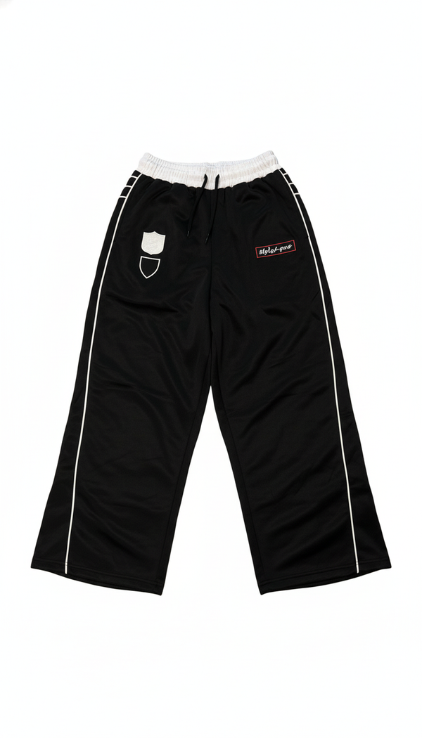 Black Shield track pants front view by Atelier mo6 – Dream Unit Amsterdam