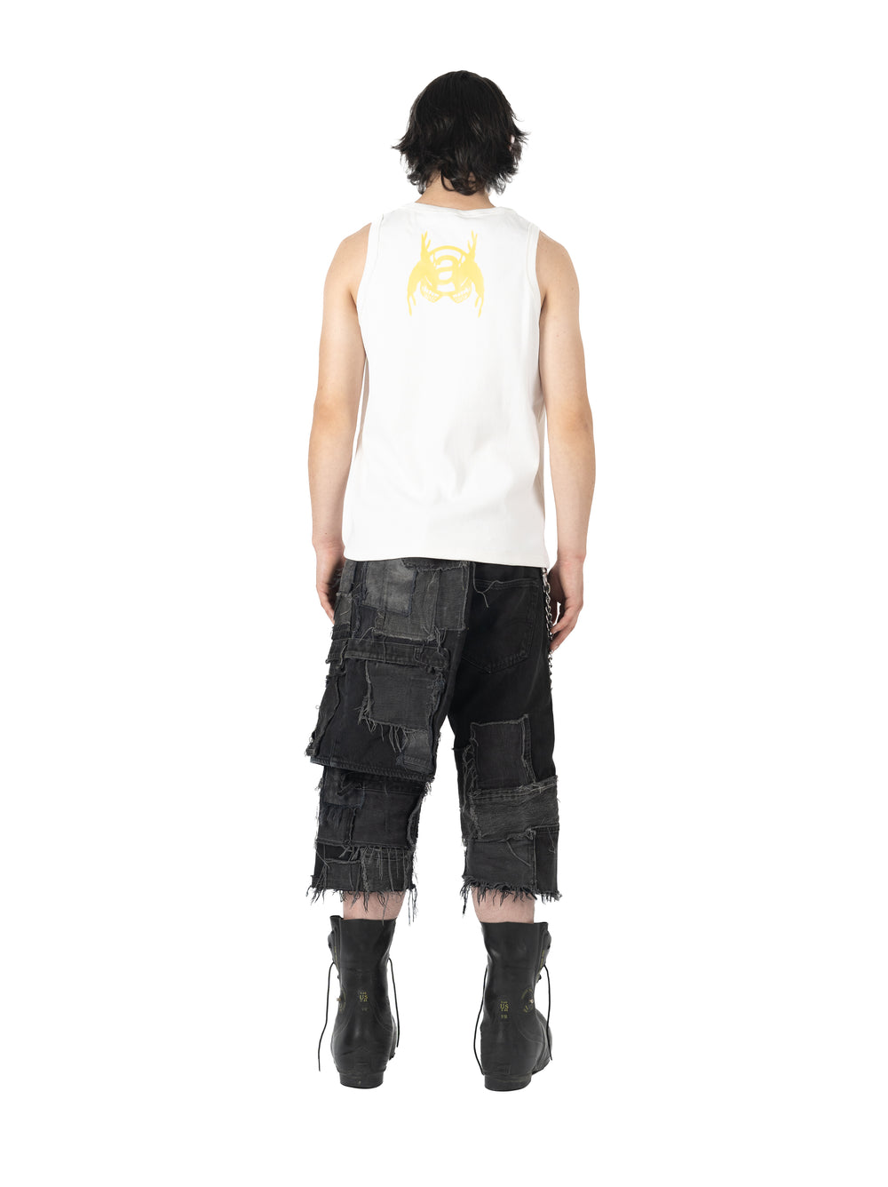 white man wearing a white tanktop 