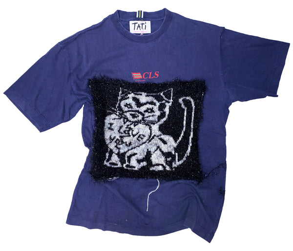 Blue t-shirt with a knitted graphic of a cat and 'CLS' logo on a white background
