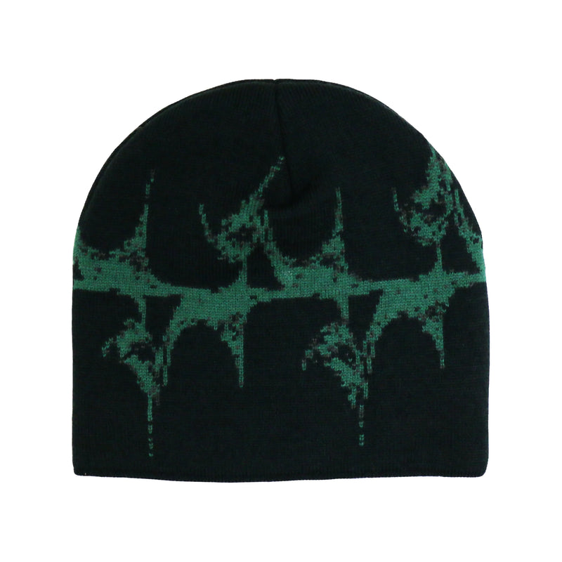 The back of A black knit beanie featuring an abstract green graphic design resembling a textured, splattered pattern that extends across the surface. The hat has a snug, rounded shape with no visible logos or embellishments.