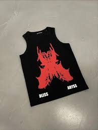 Black tank top with red graphic design on a light gray surface