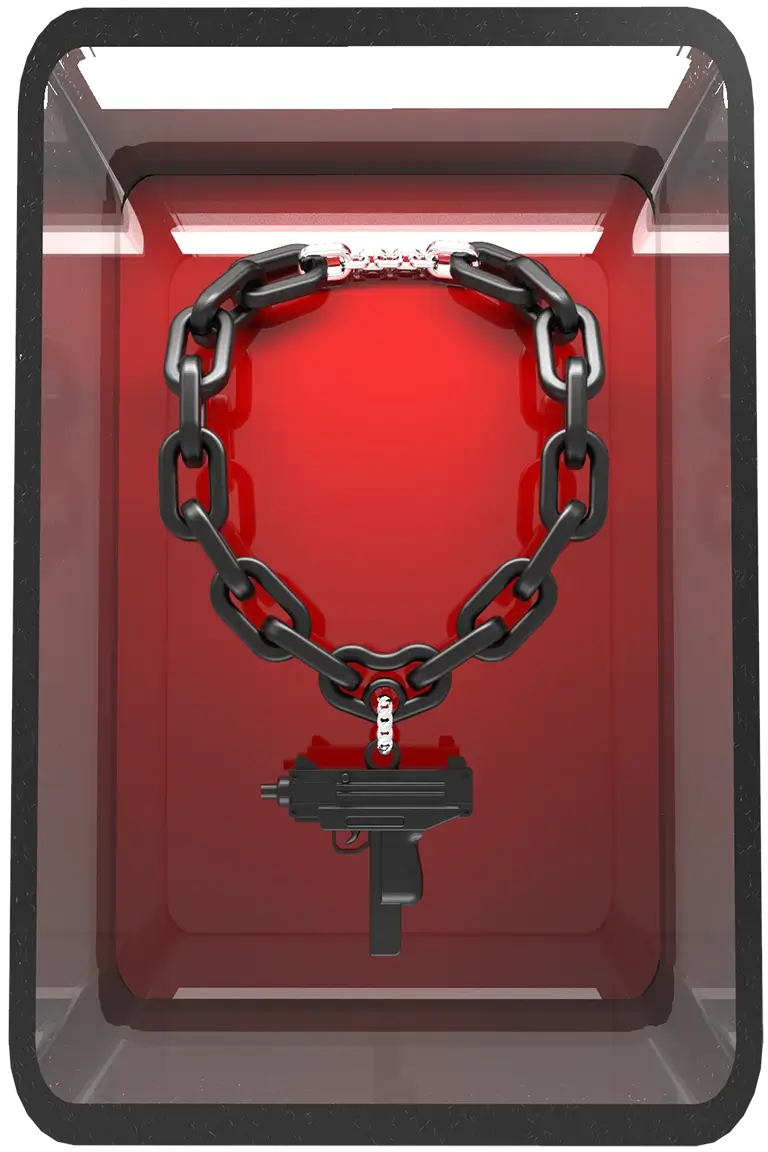 A bold necklace featuring a chunky black chain with a silver clasp, adorned with a detailed pendant in the shape of a miniature submachine gun. The design is set in a see through box with red background, to show the chunky and futuristic design.