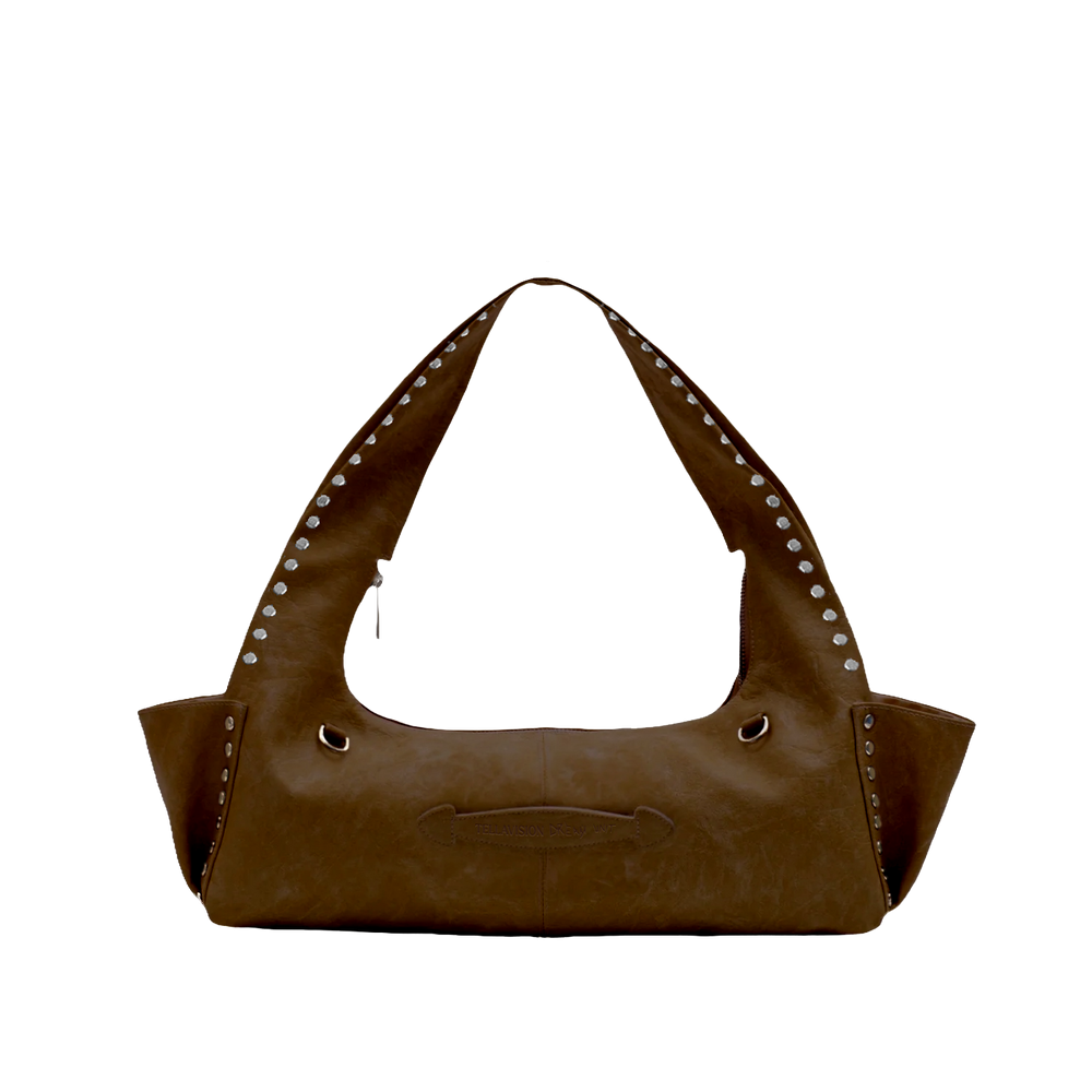 Brown handbag with studded details on a white background