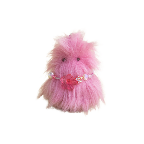 Fluffy pink handmade plush creature with floral bead belt – kawaii Daawe Baby from Mimi Planet, soft collectible toy from Hong Kong