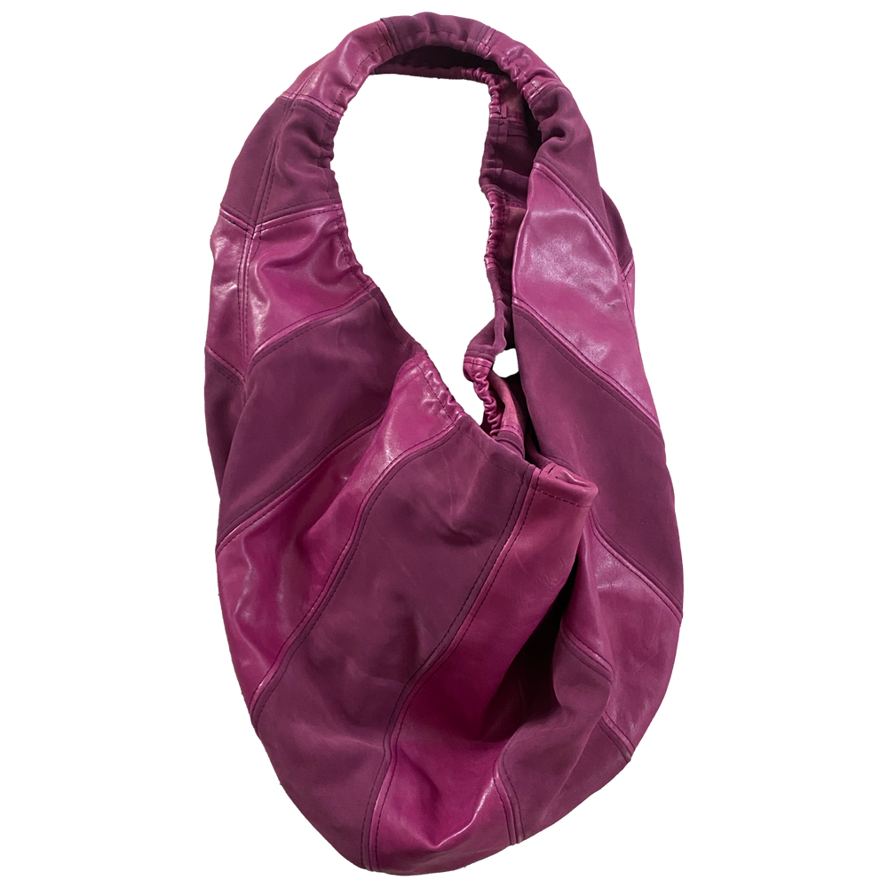 Pink handmade leather crossbody bag by Finn van der Wal — product view