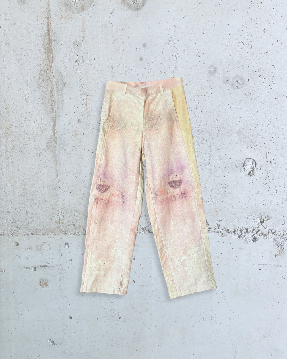 Front view of Foresight BARREL PANTS PINK by Tellavision featuring a pastel washed finish with faded pink, cream, and yellow tones.