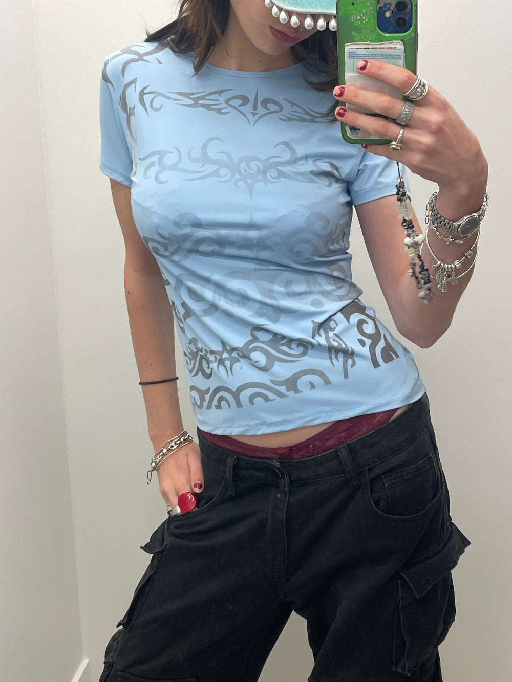 model wearing blue top 