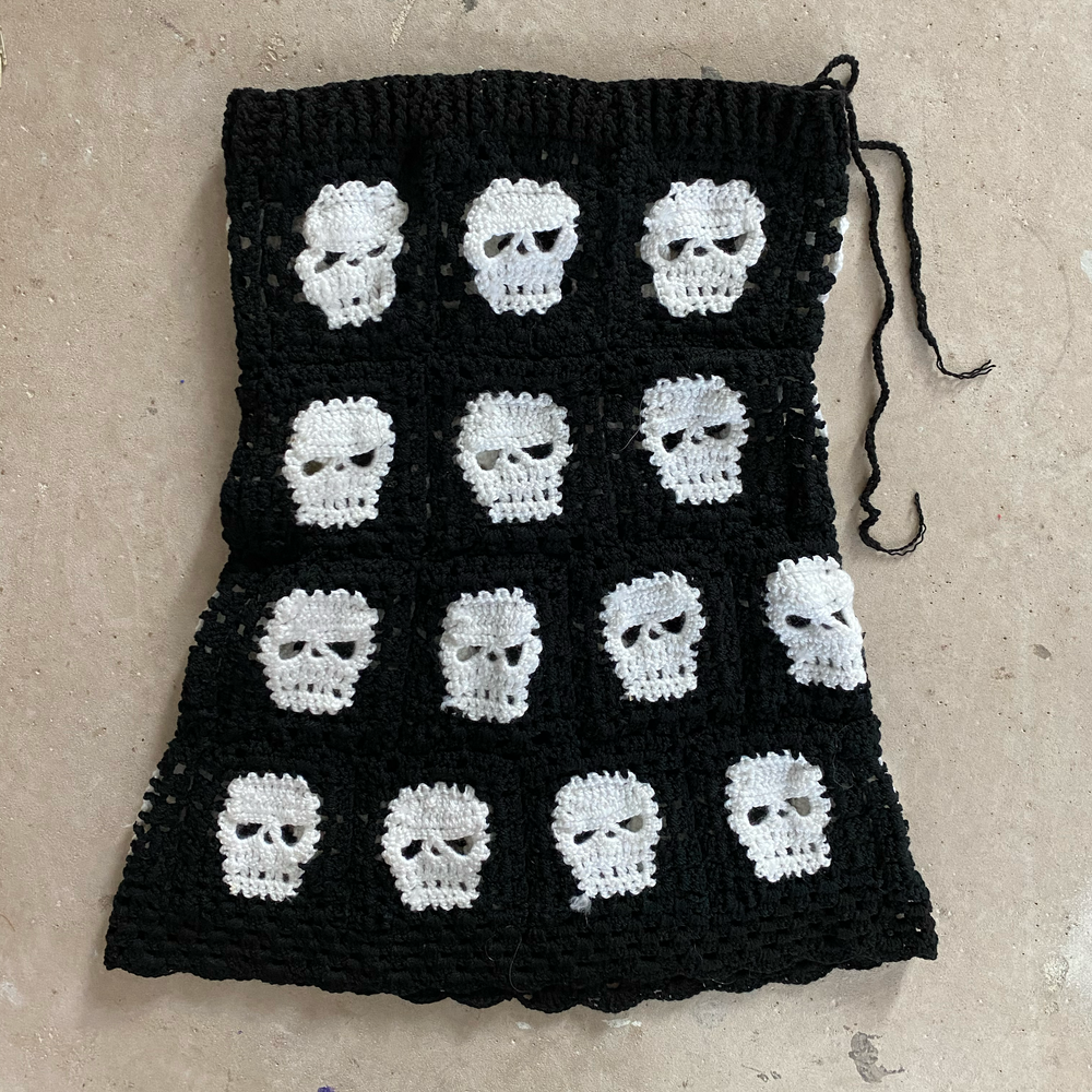 Hand-knitted skull skirt by Mondo Trasho — product view