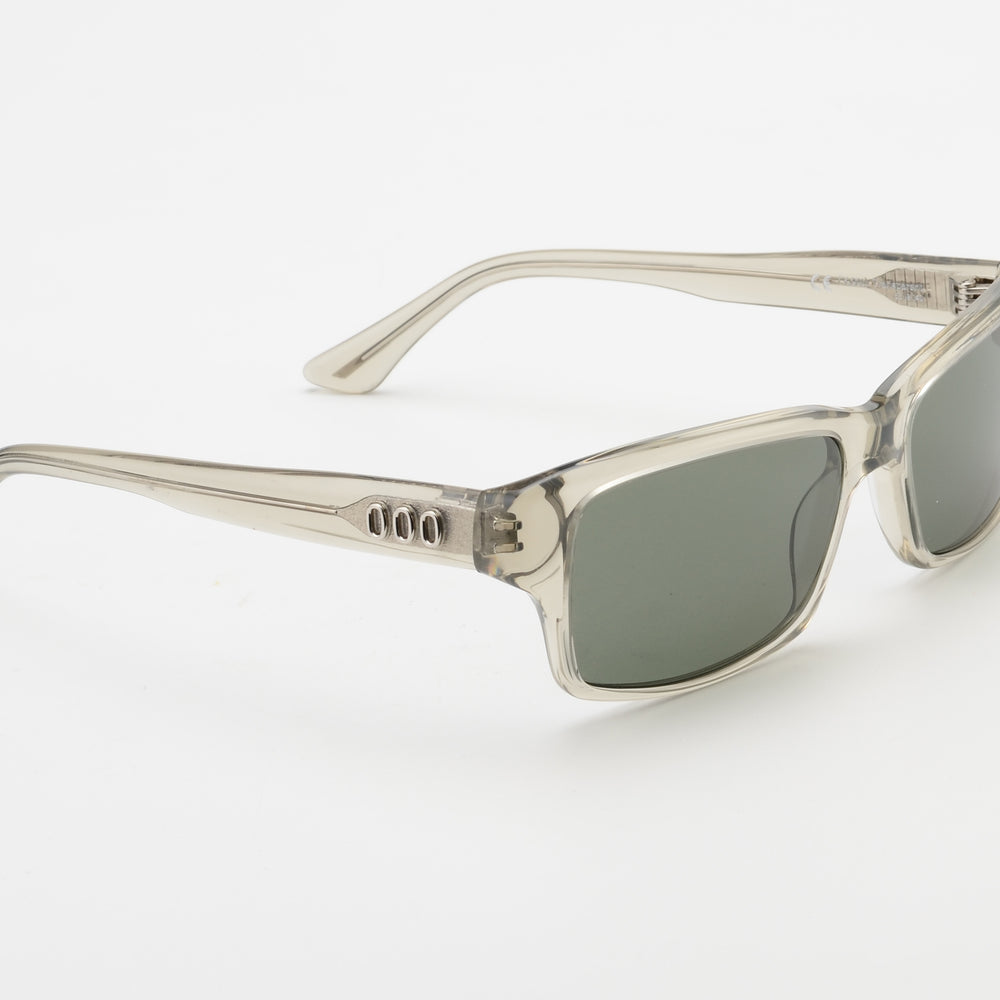 Clear frame sunglasses with dark lenses on a white background
