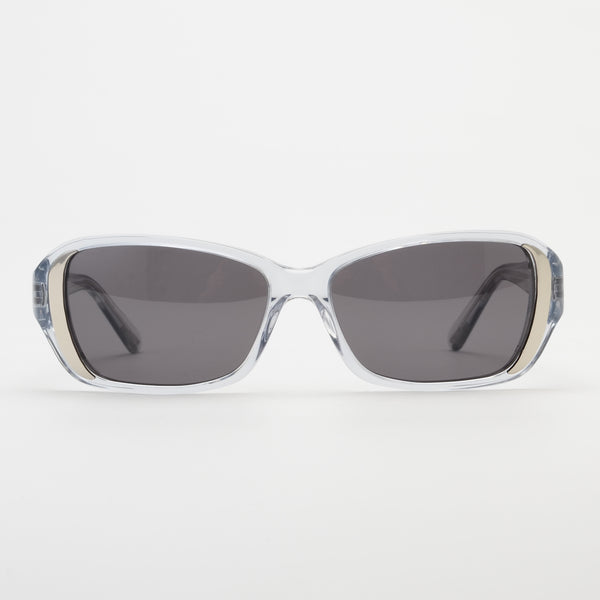 Sunglasses with clear frame and dark lenses on a white background
