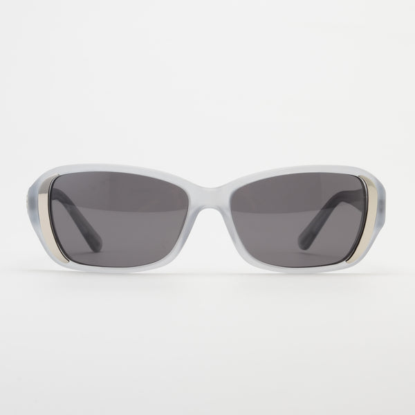 White sunglasses with dark lenses on a light gray background