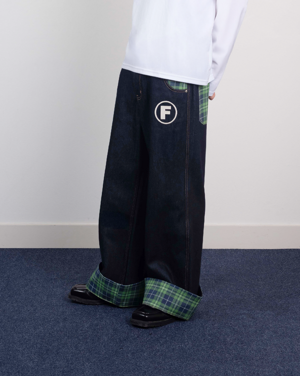 La Fam checkered F wide leg denim jeans with tartan lining at Dream Unit Amsterdam