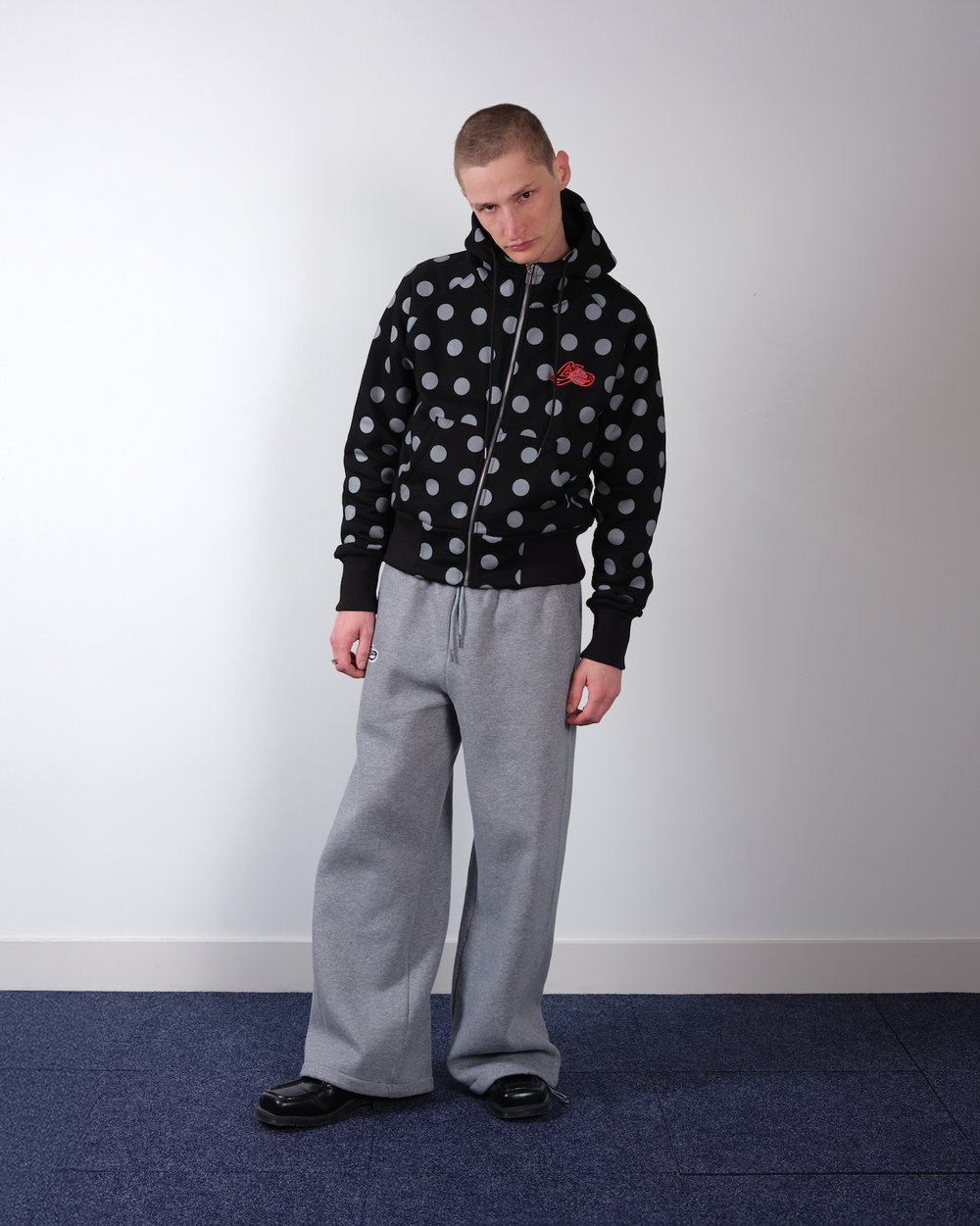 La Fam black polka dot zip hoodie with red embroidered logo at Dream Unit Amsterdam