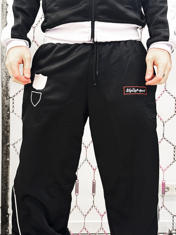 Black Shield track pants back view by Atelier mo6 – Dream Unit Amsterdam