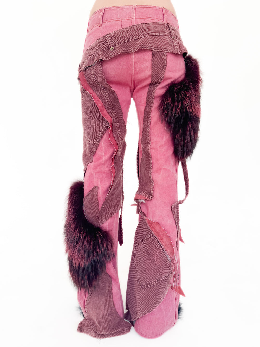 Pink pants with fur accents on a white background