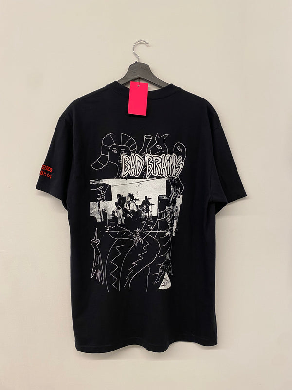 Black t-shirt with  white, screen printed graphic design and 'Bad Brains' text on a hanger 
