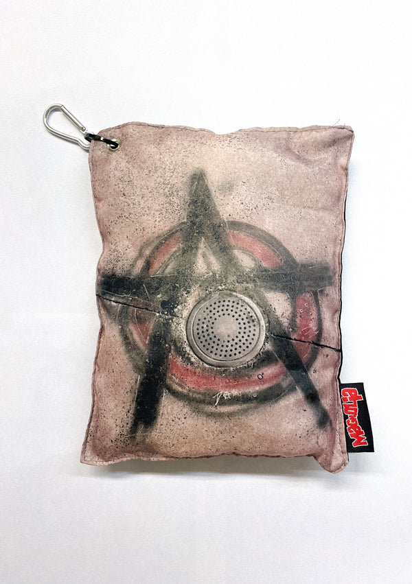 Star speaker cushion with printed star graphic, square padded fabric and metal carabiner attachment.