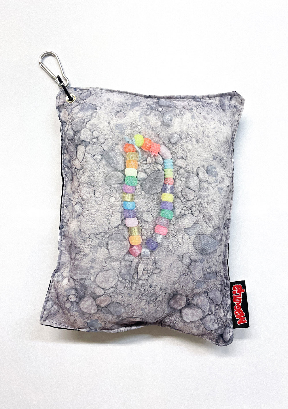 Pebble bead cushion with stone texture print, embedded colorful beads, square padded fabric and carabiner.
