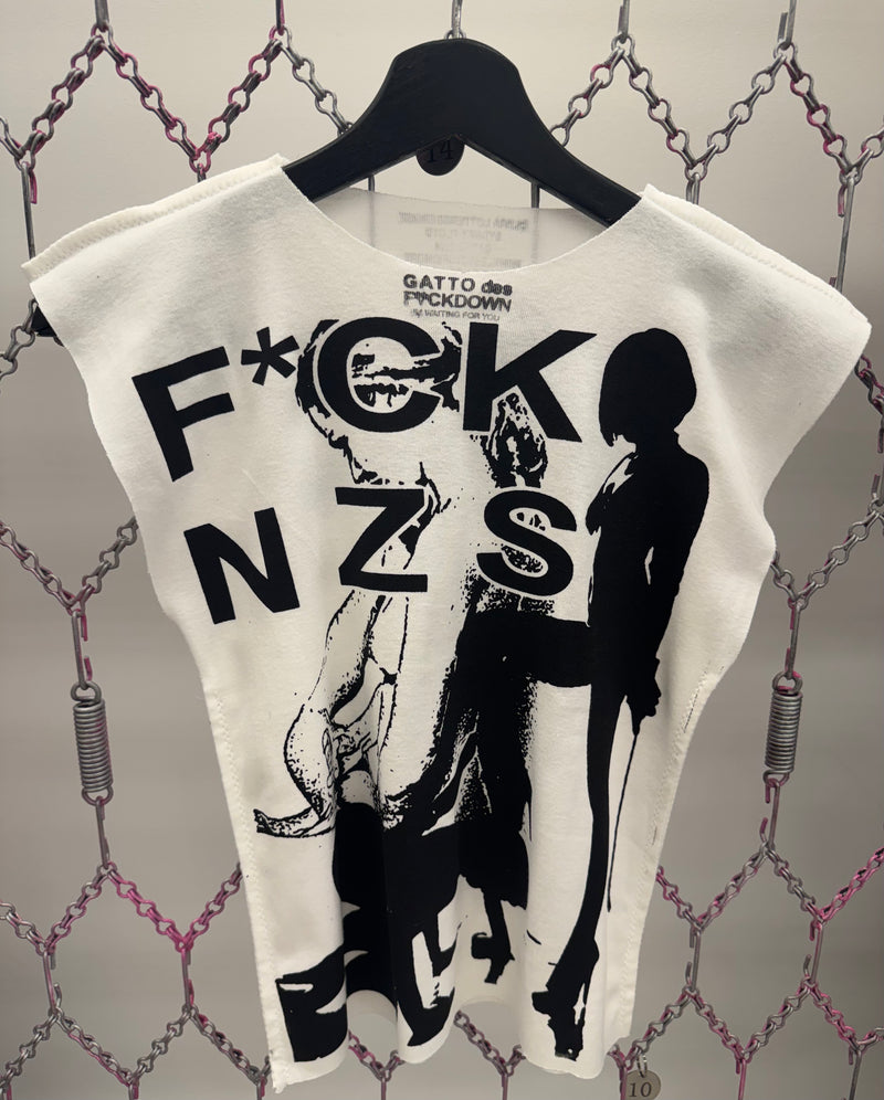 White t-shirt with black graphic design and text on a chain-link fence background