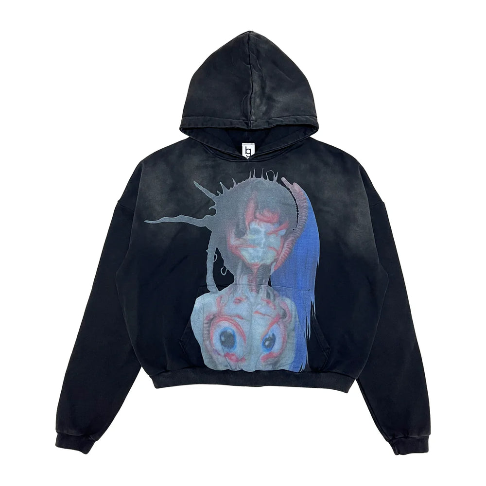 Black hoodie with a graphic design on a white background