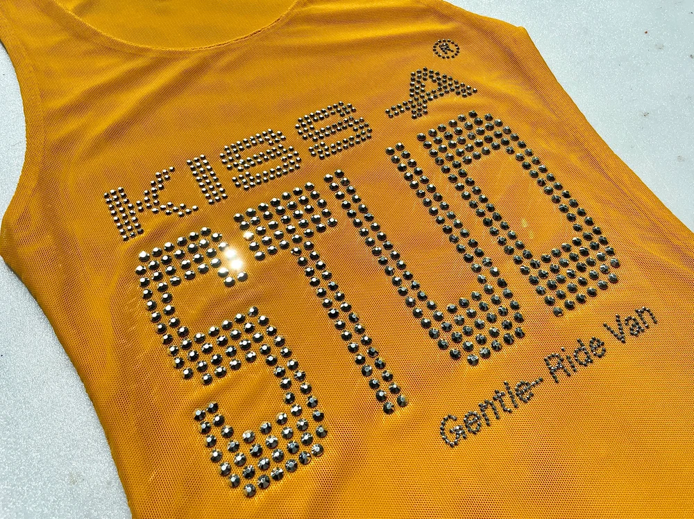 Maizie Kiss a Stud top — silver rhinestone slogan detail