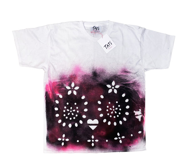 White t-shirt with black and pink tie-dye design and white patterns on a white background
