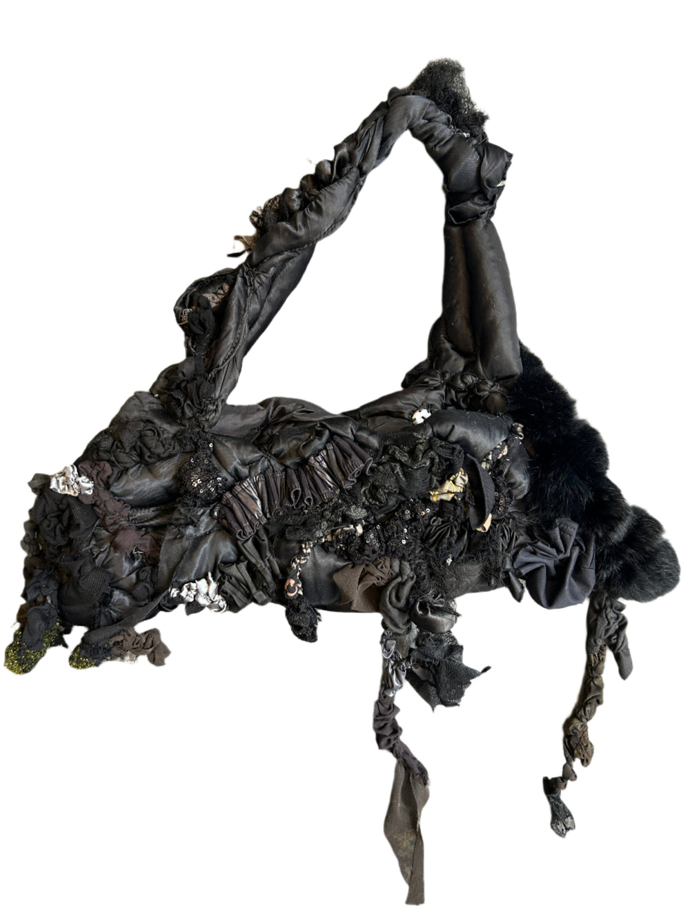 Black handbag garment on a wooden surface