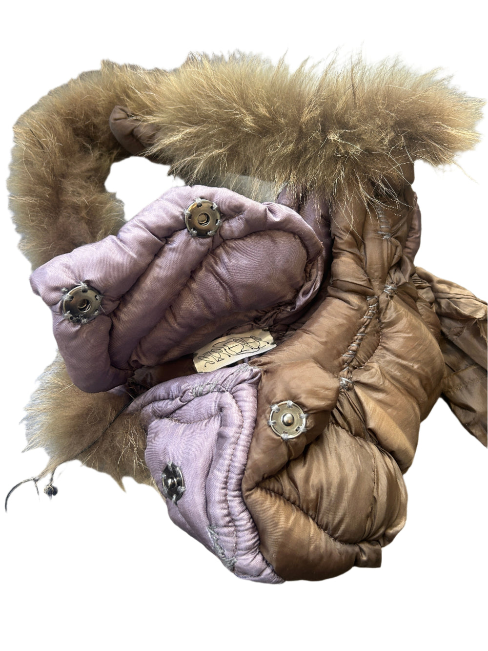 puffer handbag with fur trim on a wooden surface