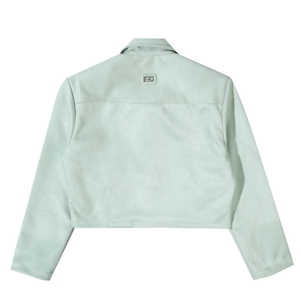 Close-up of Tellavision mint suede jacket collar and zipper