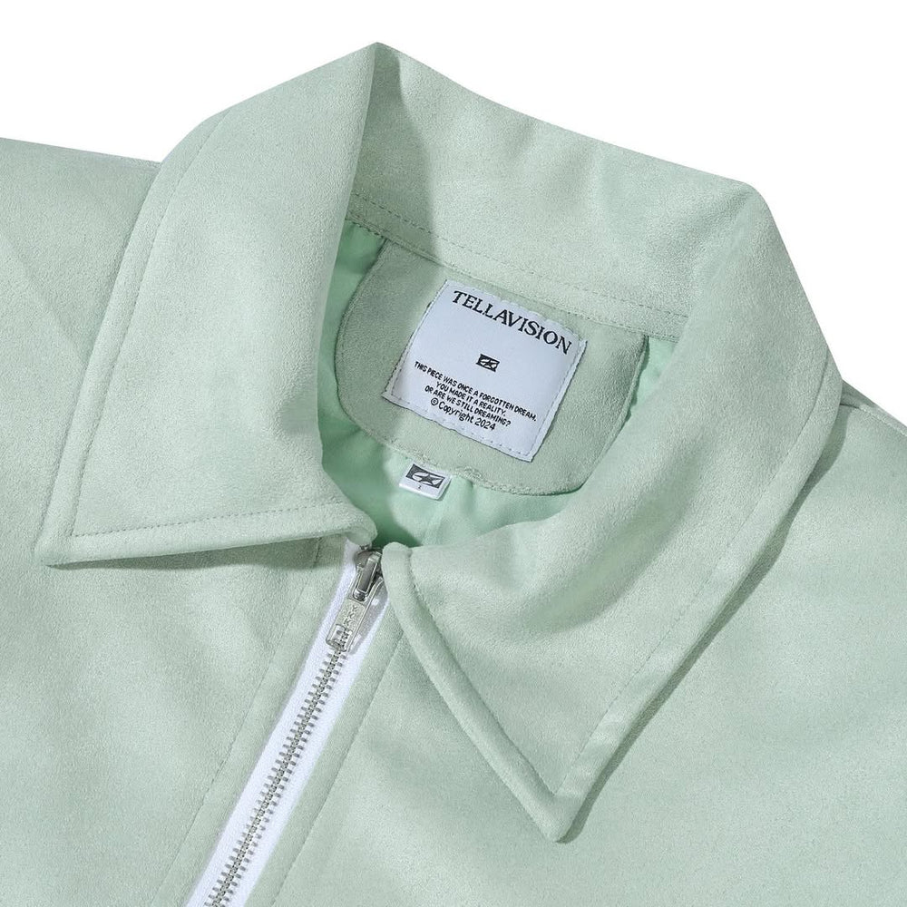 Close-up of Tellavision mint suede jacket collar and zipper