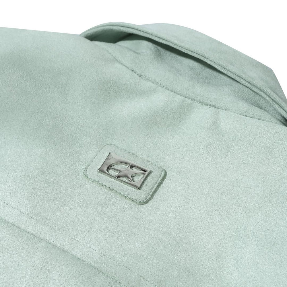 Silver logo detail on back of Tellavision mint suede jacket