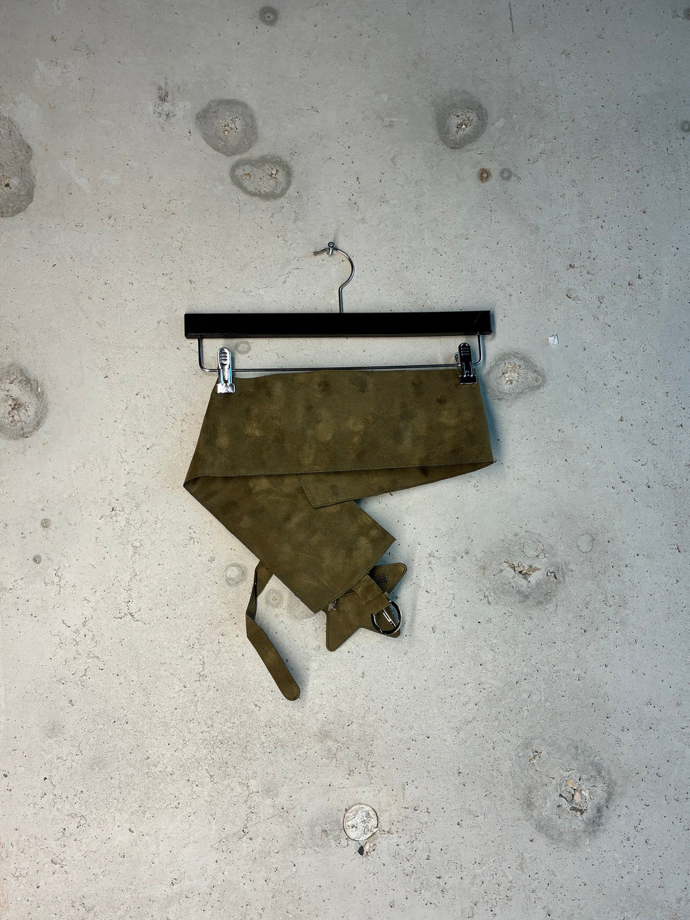 Back view of olive green Tellavision U.S.B belt