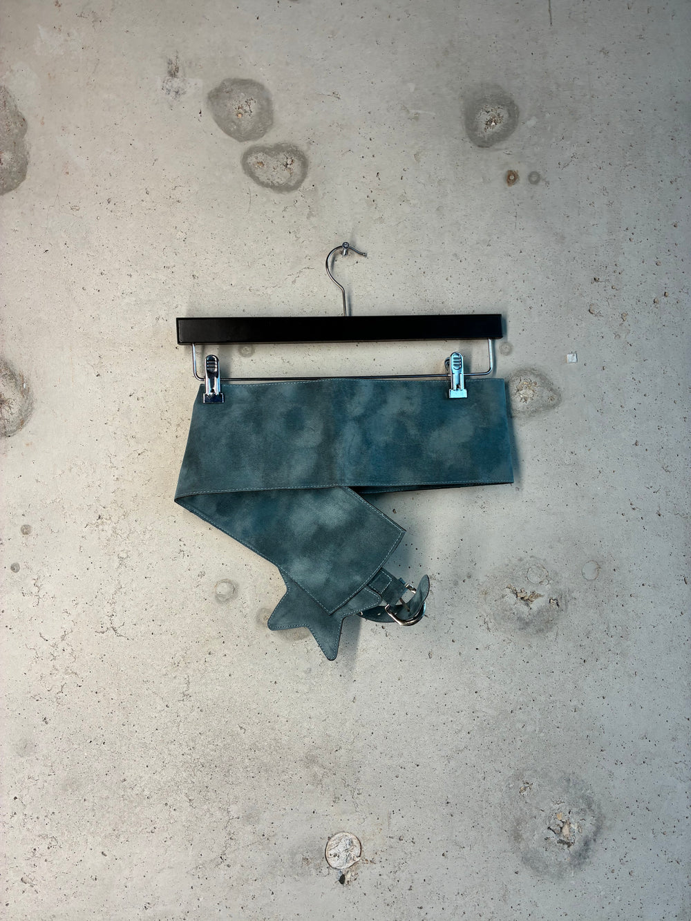 Back view of blue Tellavision suede utility belt with layered wrap silhouette