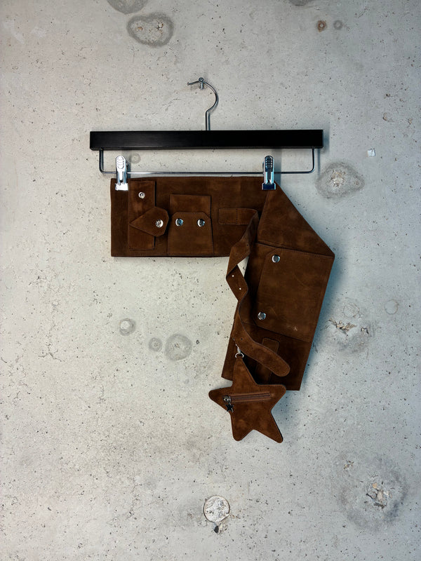 Brown suede Tellavision u.s.b. belt with detachable pocket details.